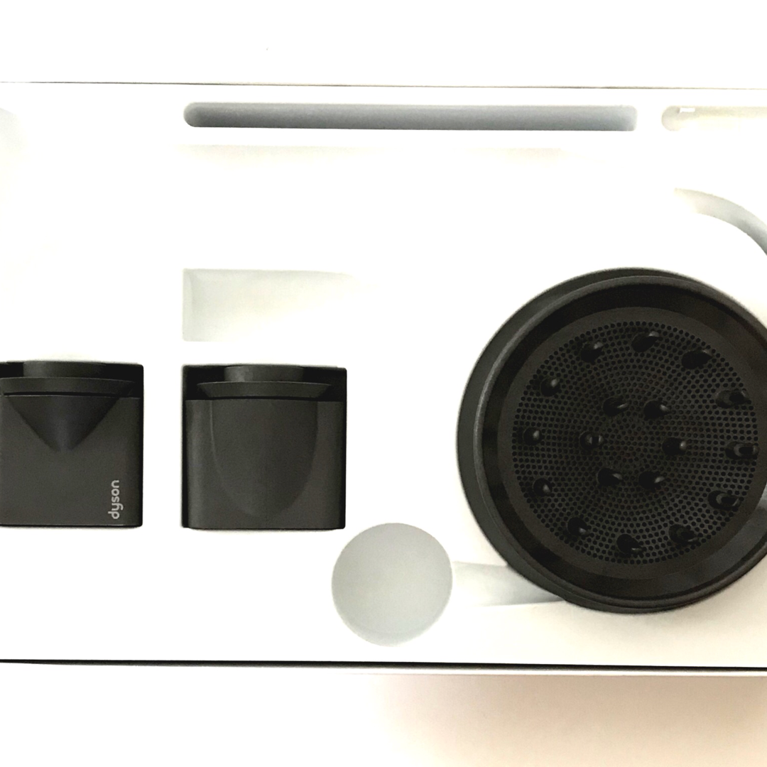 Dyson Supersonic hair dryer inside contents on the box