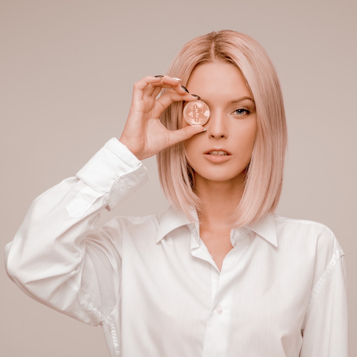 blonde woman wearing a white shirt