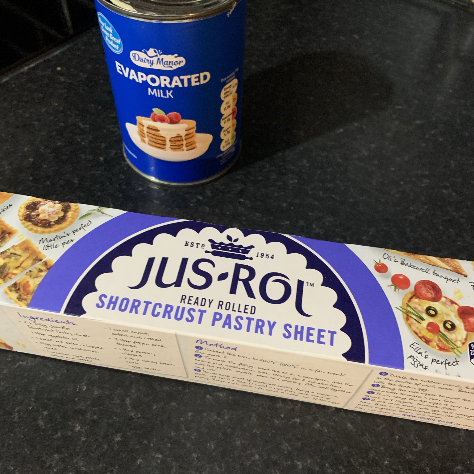 a roll of pastry and a can of evaporated milk