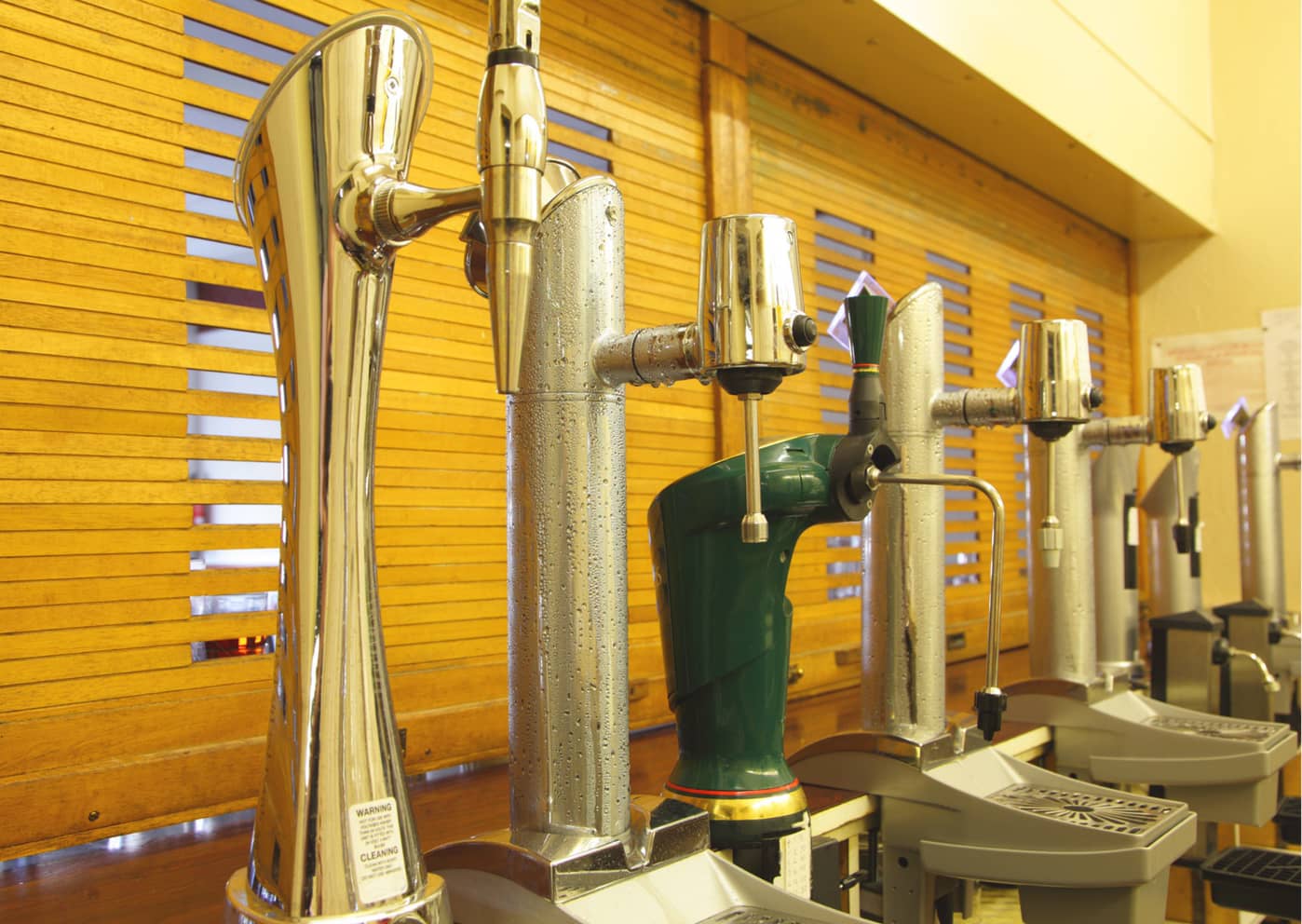 a row of beer pumps