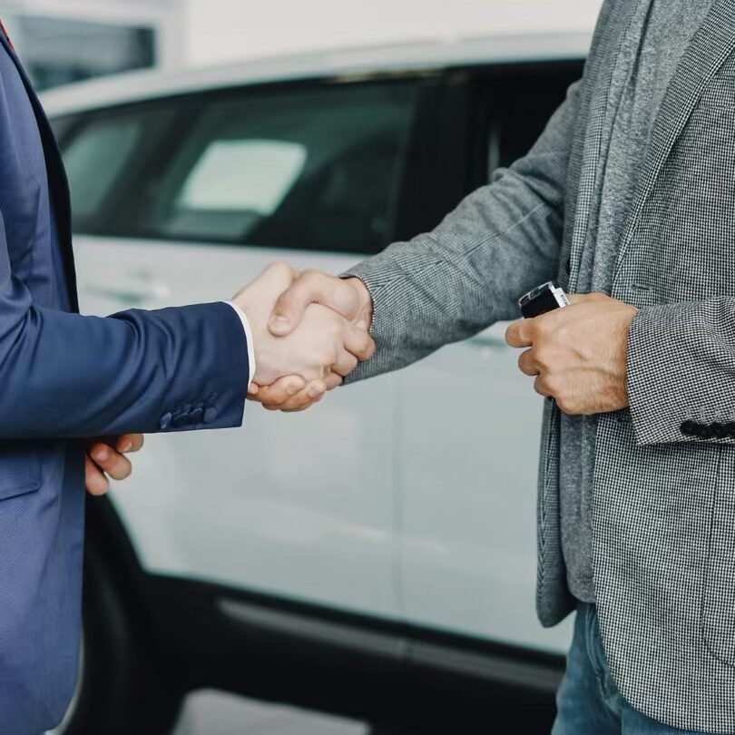2 men shaking hands